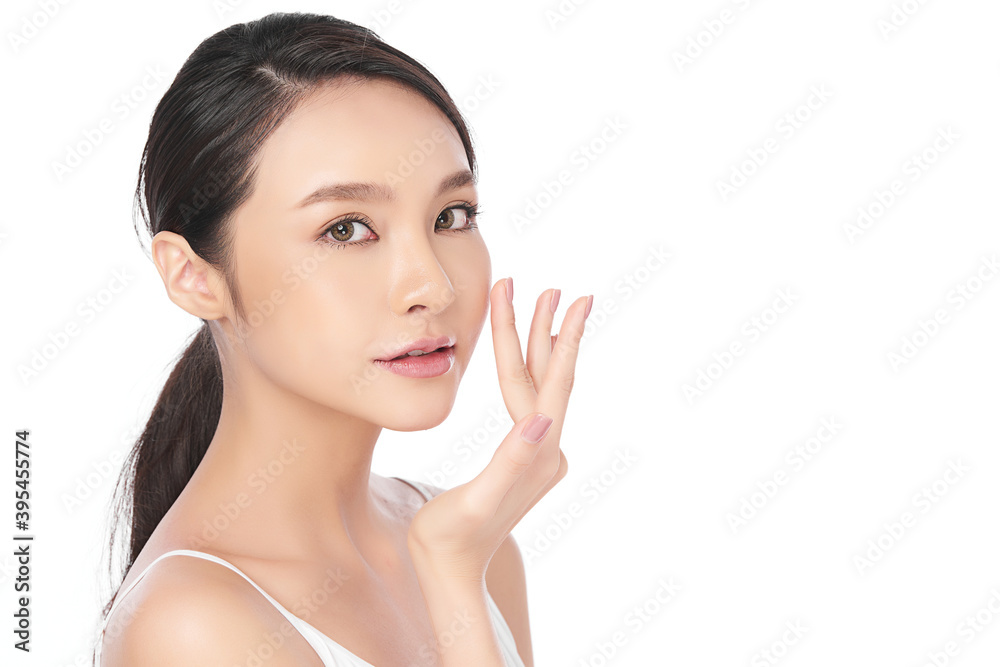 Beautiful young asian woman with clean fresh skin on white background, Face care, Facial treatment, Cosmetology, beauty and spa, Asian women portrait Beautiful young asian woman with clean fresh skin on white background, Face care, Facial treatment, Cosmetology, beauty and spa, Asian women portrait