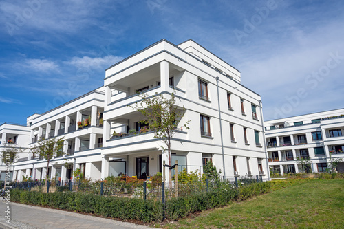 Modern white apartment houses in a development area in Berlin, Germany