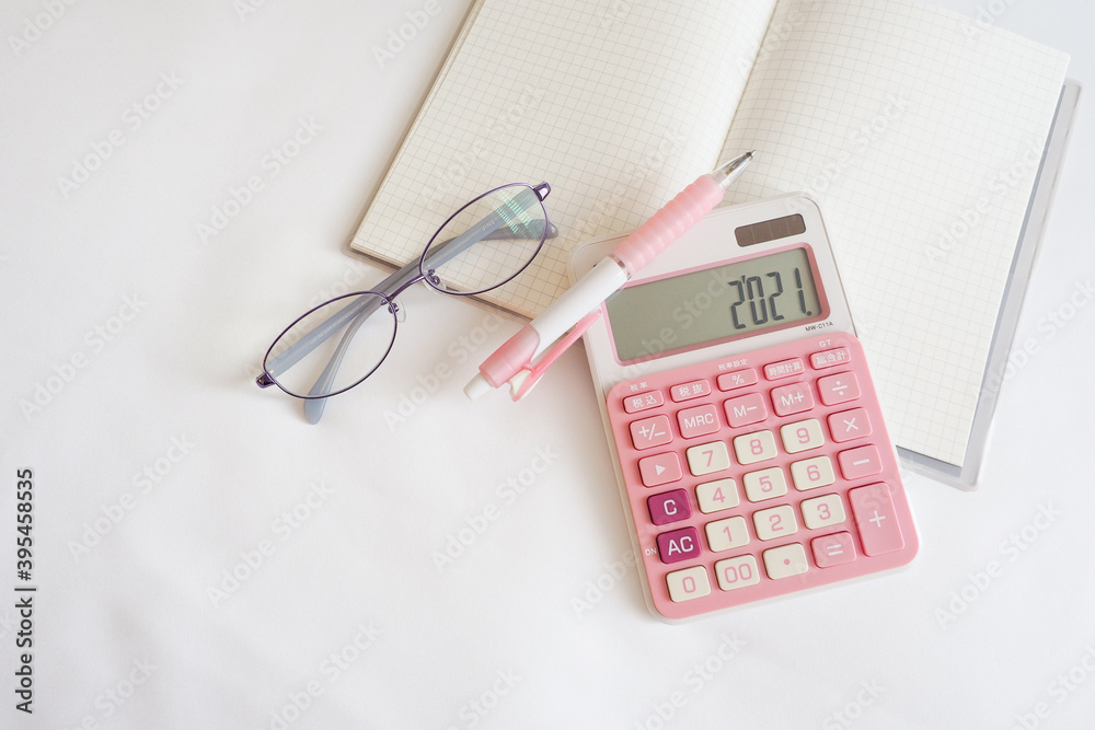 New year planner for financial, notebook, calculator, on white background, report work image, copy space New year planner for financial, notebook, calculator, on white background, report work image, copy space