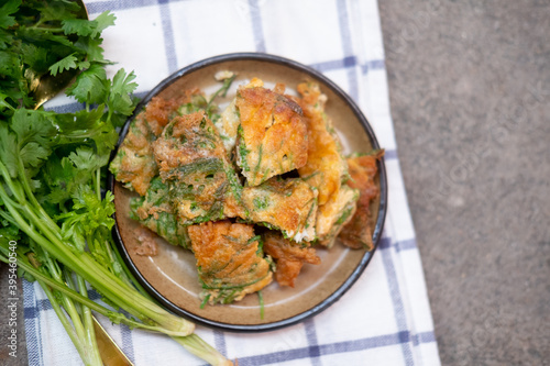 Fried acacia pennata omelet or cha-om eggs