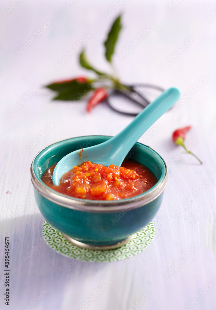 Chilli sauce with papaya in an oriental bowl Chilli sauce with papaya in an oriental bowl