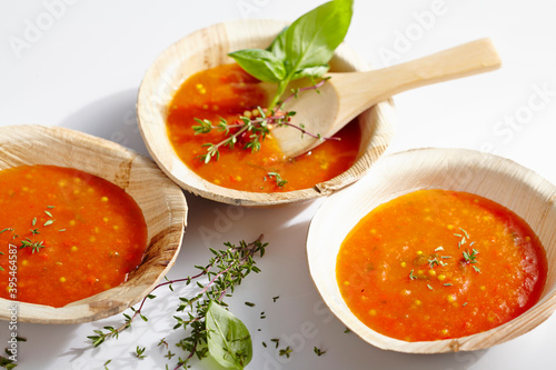 Homemade spicy papaya sauce with chilli, tomatoes and herbs photo