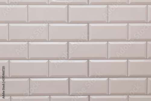 Texture of white brick wall made from vinyl panels background