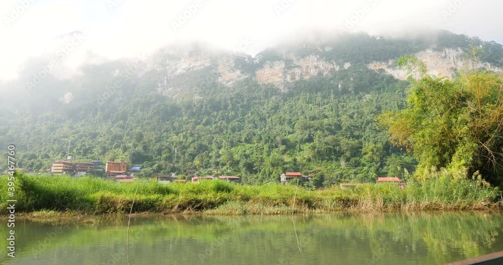 Cinematic shot from a moving boat in the lake of natural scenery in Asia. Cinematic shot from a moving boat in the lake of natural scenery in Asia.