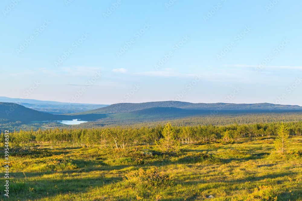 Beautiful scenics landscape view over forest and a lake