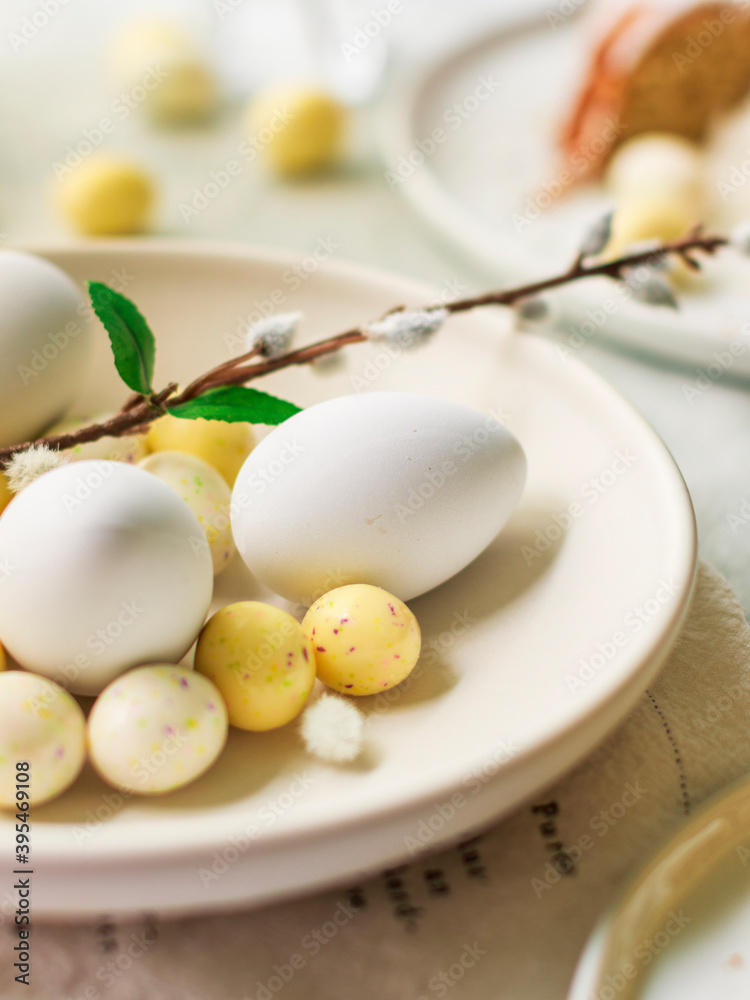 White eggs and chocolate Easter eggs White eggs and chocolate Easter eggs