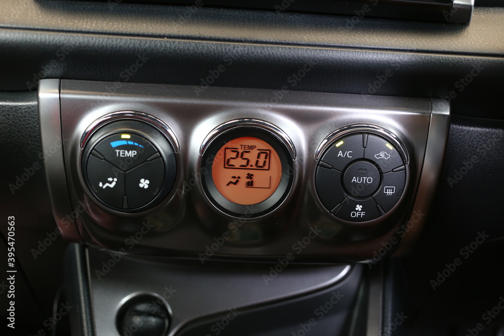 Car air conditioning system, The air conditioning button inside a car.