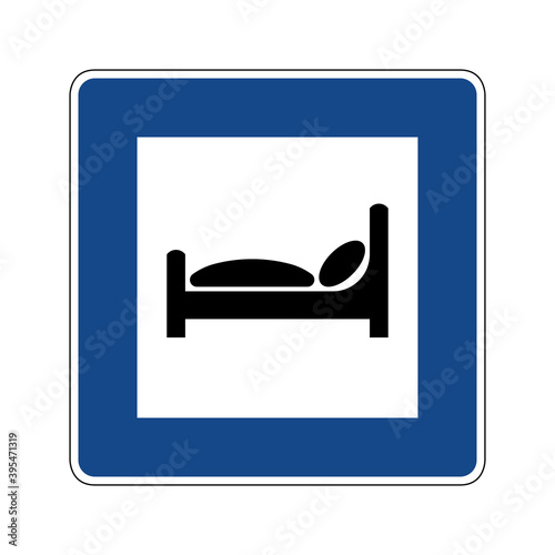 Motorway hotel road sign. Vector illustration of blue square traffic sign with man sleeping in bed icon inside. Motel symbol isolated on white background. Accommodation sign used in Germany.