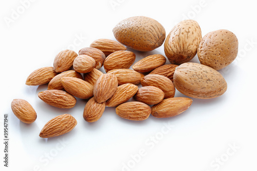 Almonds, unshelled and shelled photo