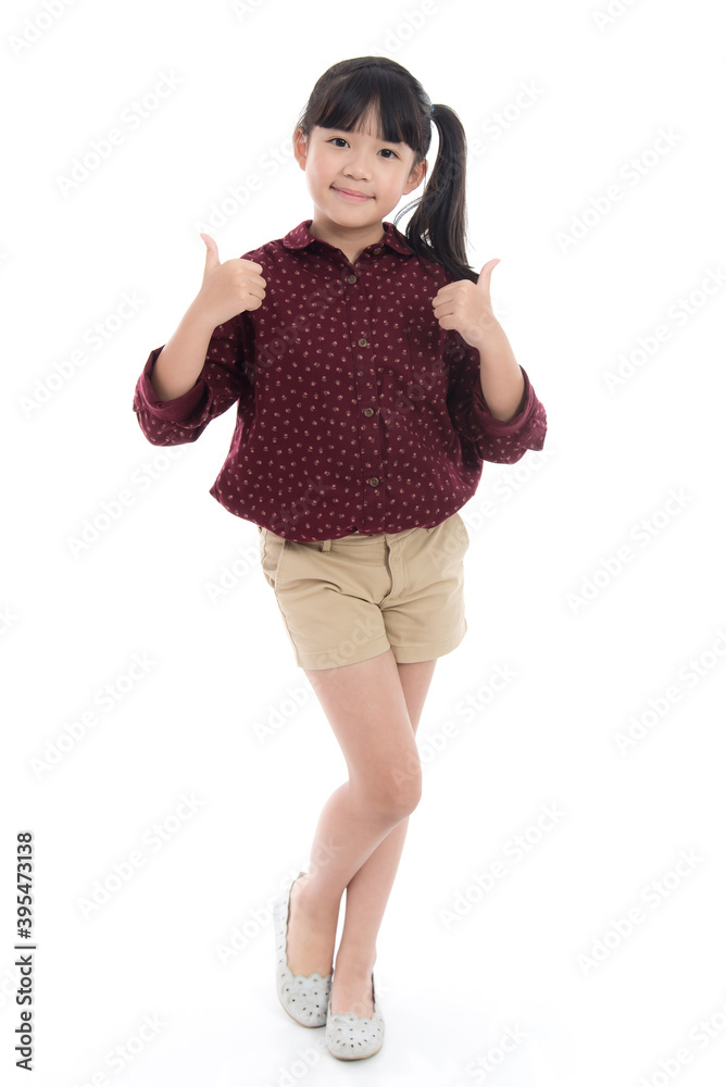 Beautiful asian girl showing thumbs up on white background isolated Beautiful asian girl showing thumbs up on white background isolated