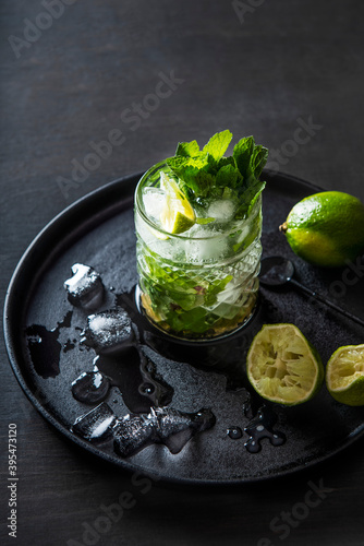 Mojito cocktail with fresh lime and mint