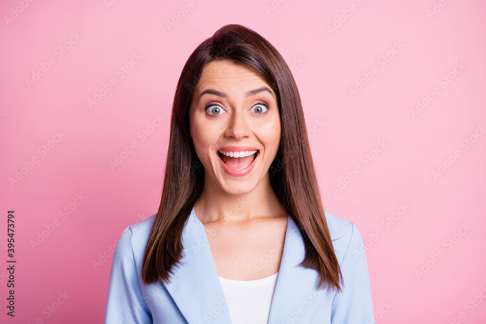 Portrait of young attractive smiling excited shocked amazed girl woman female look camera open mouth isolated on pink color background Portrait of young attractive smiling excited shocked amazed girl woman female look camera open mouth isolated on pink color background