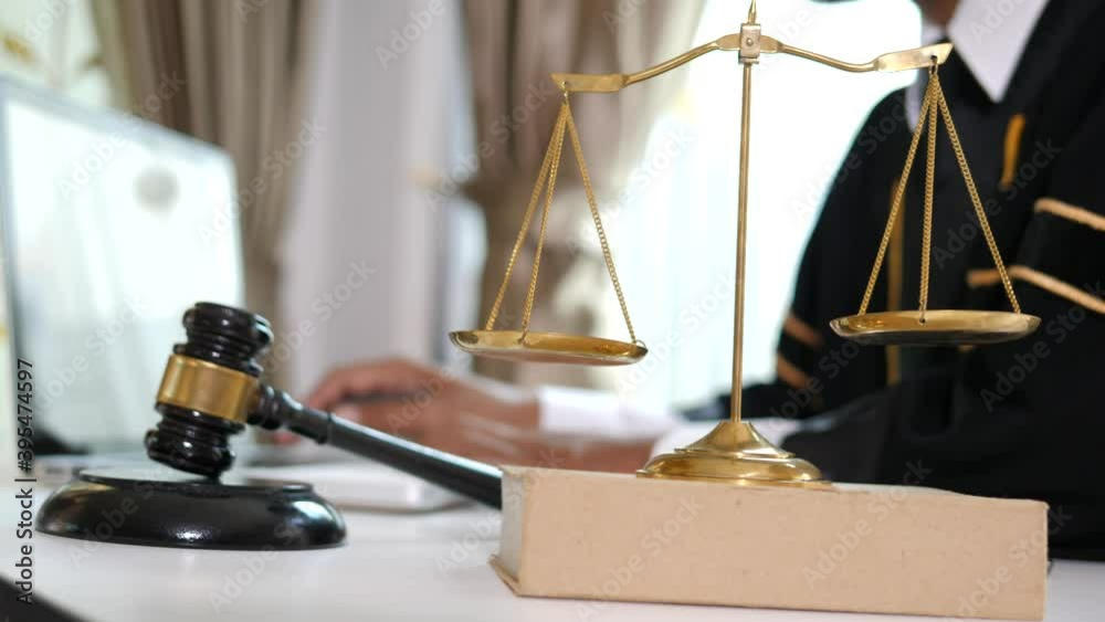 Partner lawyers or attorneys discussing a contract agreement. Successful businessmen have a contract in place to protect it,signing of modest agreements form in office There are different icons relate Partner lawyers or attorneys discussing a contract agreement. Successful businessmen have a contract in place to protect it,signing of modest agreements form in office There are different icons relate