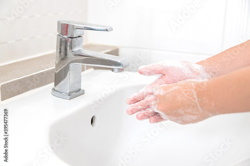 Washing your hands with soap for cleaning helps prevent germs