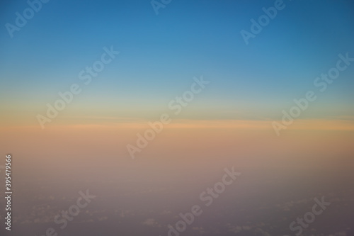 Beautiful blue sky before sunset with clouds shoot on airplane