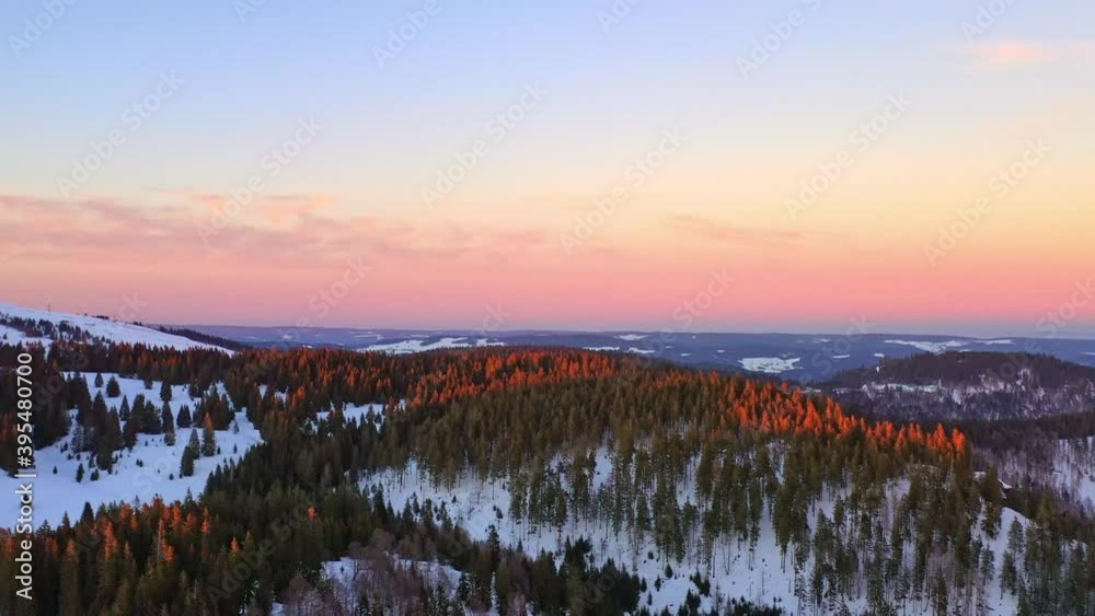 Aerial view of Black Forest landscape at sunrise in winter, German mountain area covered by snow Aerial view of Black Forest landscape at sunrise in winter, German mountain area covered by snow