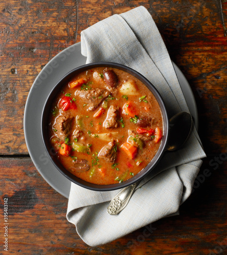 Winter beef stew in bowl photo