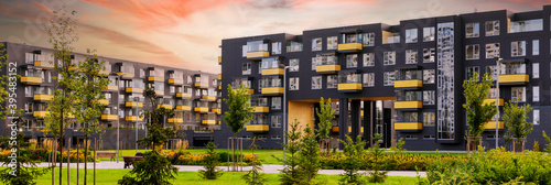 modern architecture of urban residential apartment buildings at sunset photo