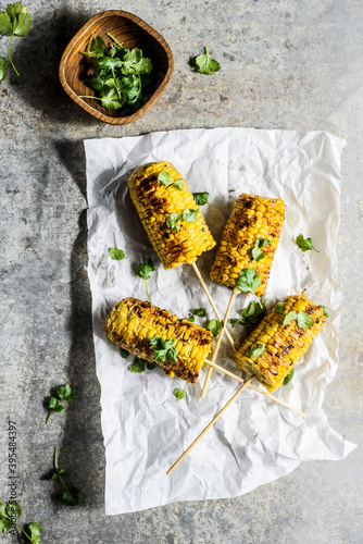 Grilled corn and fresh coriander photo