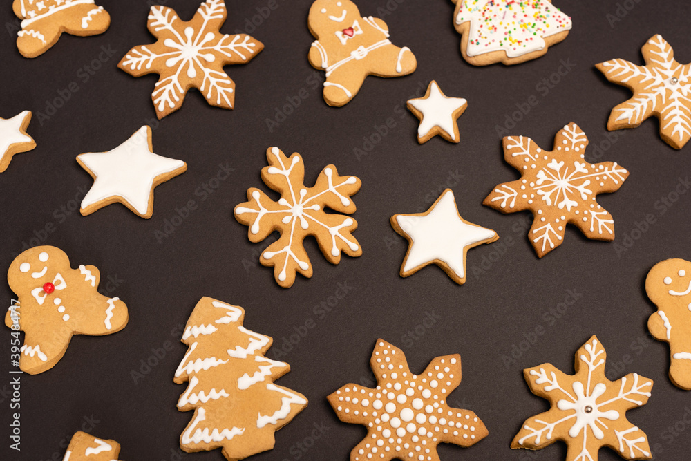 top view of gingerbread cookies on black 