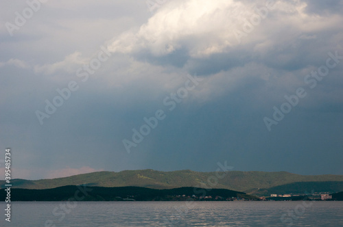 Rain clouds above hills on Turgoyak lake in Ural