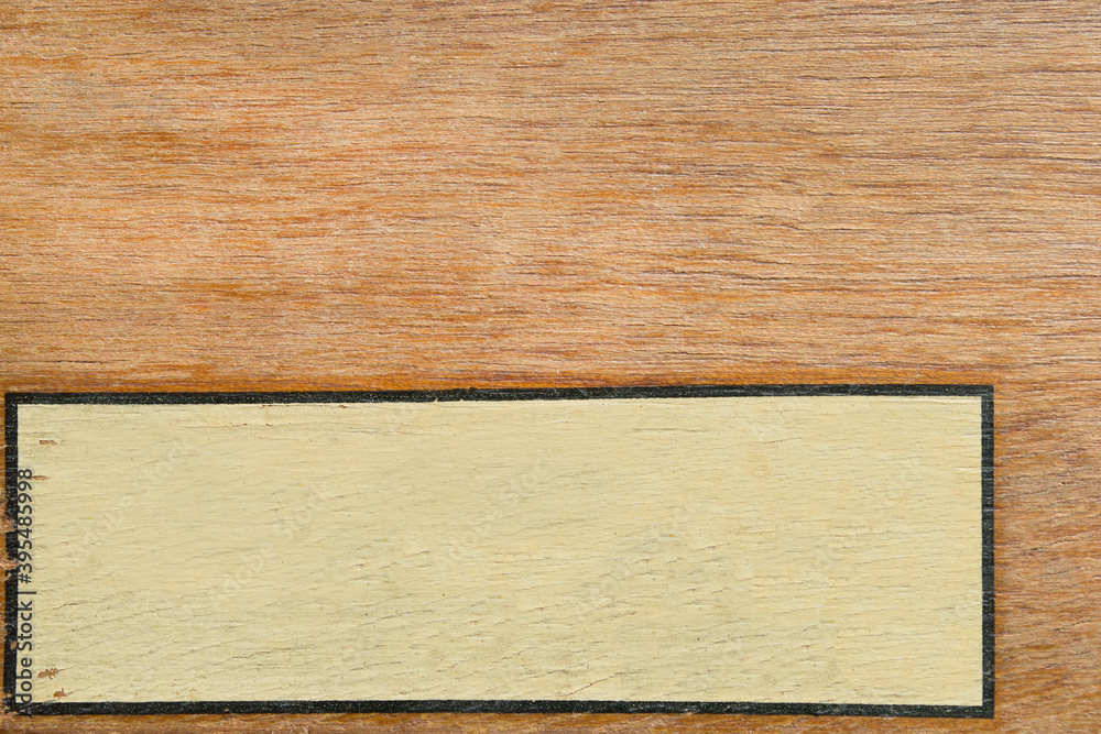 Naklejka premium Frame on wooden background