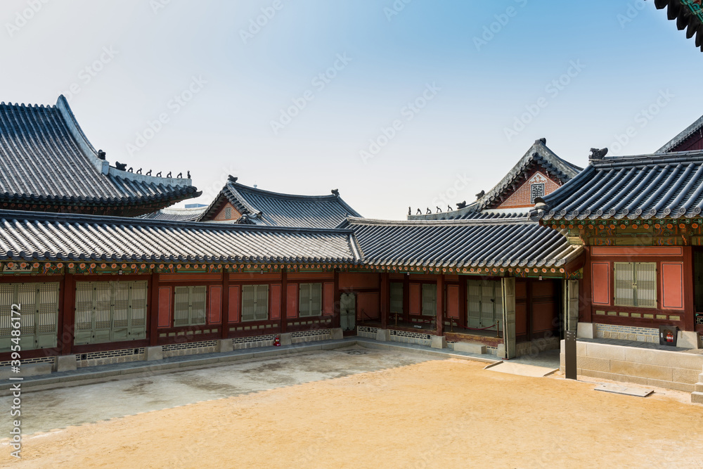 Korean wooden traditional house with black tiles in Gyeongbokgung,  also known as Gyeongbokgung Palace or Gyeongbok Palace, the main royal palace of Joseon dynasty.