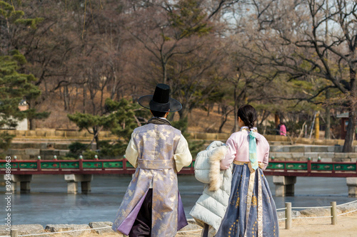 Tourists wearing traditional Korean clothes Hanbok at the Gyeongbokgung Gyeongbokgung Palace or Gyeongbok Palace, the main royal palace of Joseon dynasty. photo