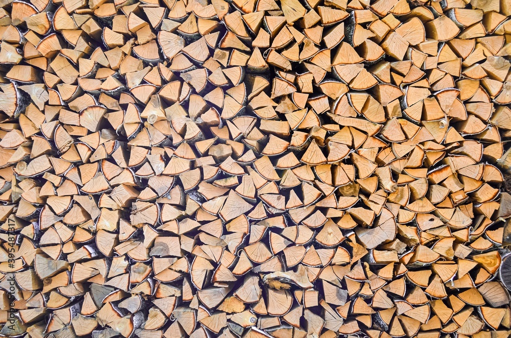 Close-up of a wooden wall. Firewood. Billet. Close-up of a wooden wall. Firewood. Billet.