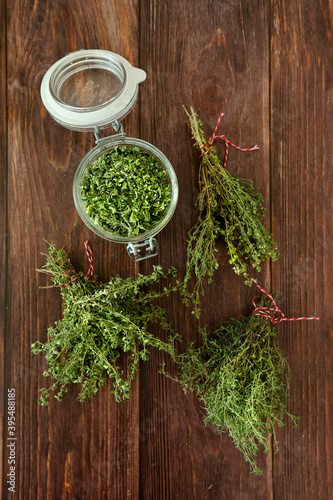 Dried aromatic herbs - thyme lemon thyme and Greek basil photo