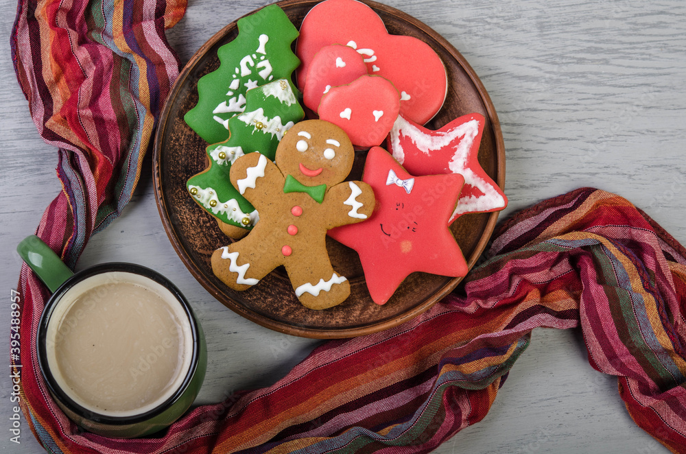 Christmas treat: gingerbread cookies and a mug of hot chocolate.
