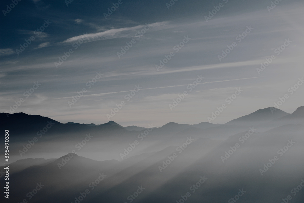 Misty mountains at sunrise landscape photography