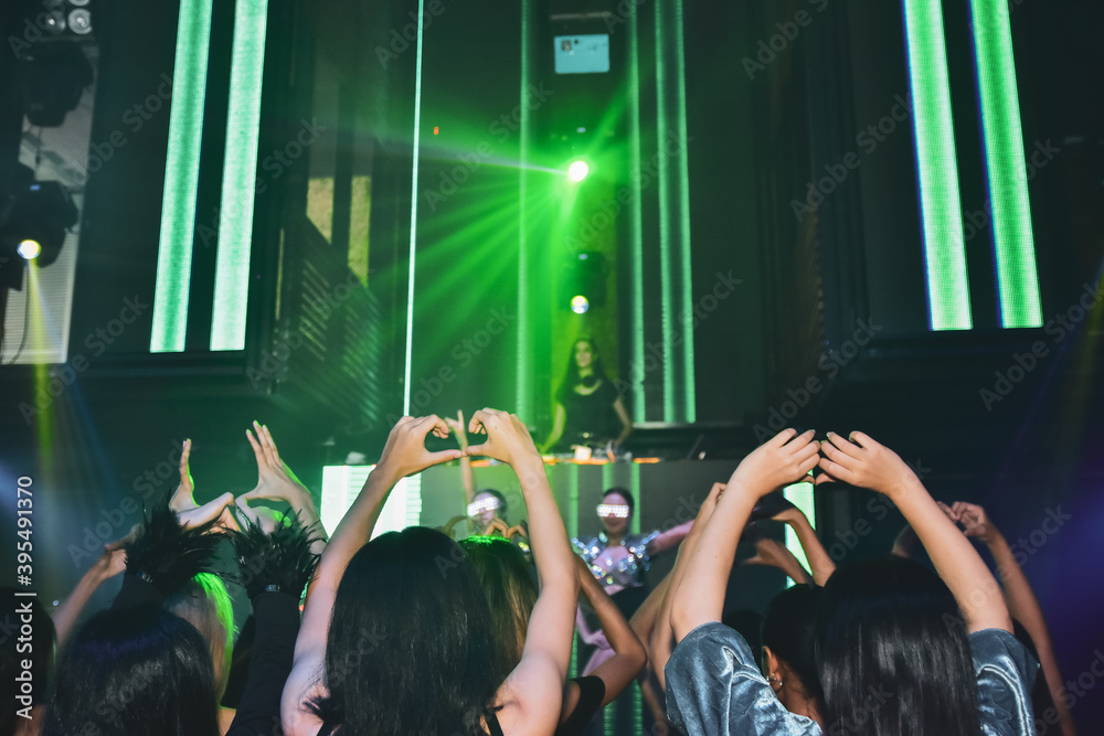 Obraz premium Group people Asian women dancing in night party, Happy new year party concert