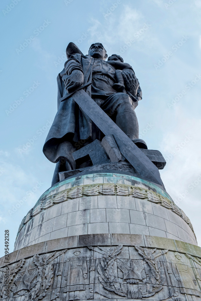 The sculpture of the liberating soviet warrior in the Soviet War Memorial (Sowjetisches Ehrenmal) in Treptower Park, Berlin