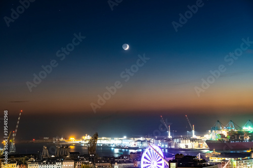View of the port of Genoa in the moonlight photo