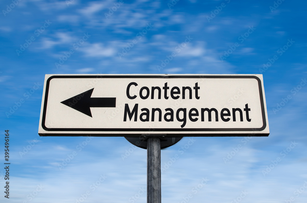 Content management road sign, arrow on blue sky background. One way blank road sign with copy space. Arrow on a pole pointing in one direction. Content management road sign, arrow on blue sky background. One way blank road sign with copy space. Arrow on a pole pointing in one direction.