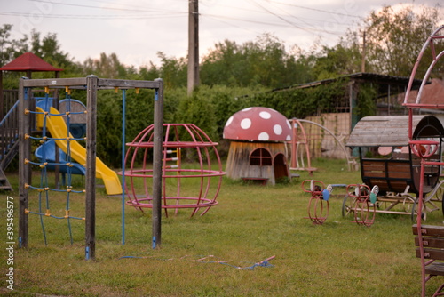 Fototapeta Naklejka Na Ścianę i Meble -  playground for children in the yard of the primary school in the village