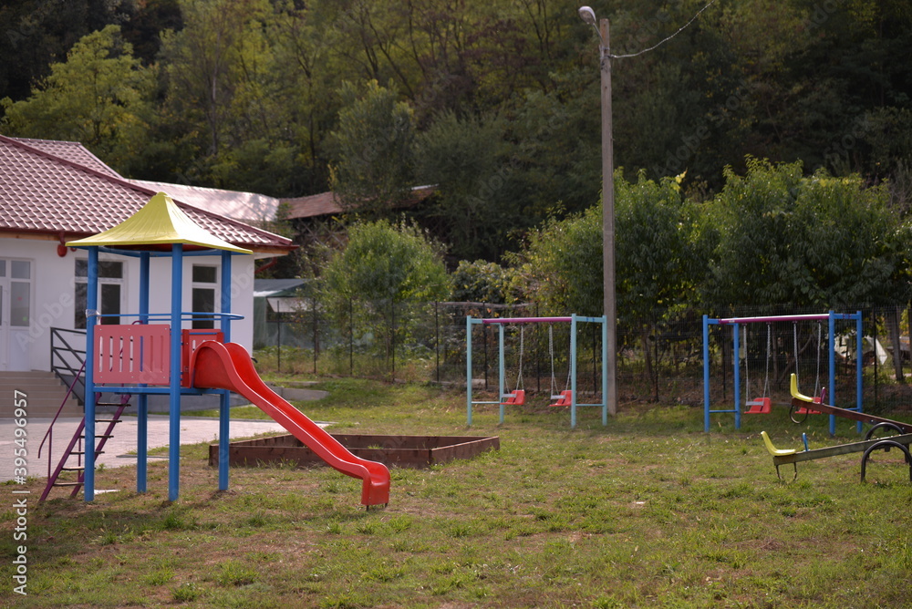 playground for children in the yard of the primary school in the village playground for children in the yard of the primary school in the village