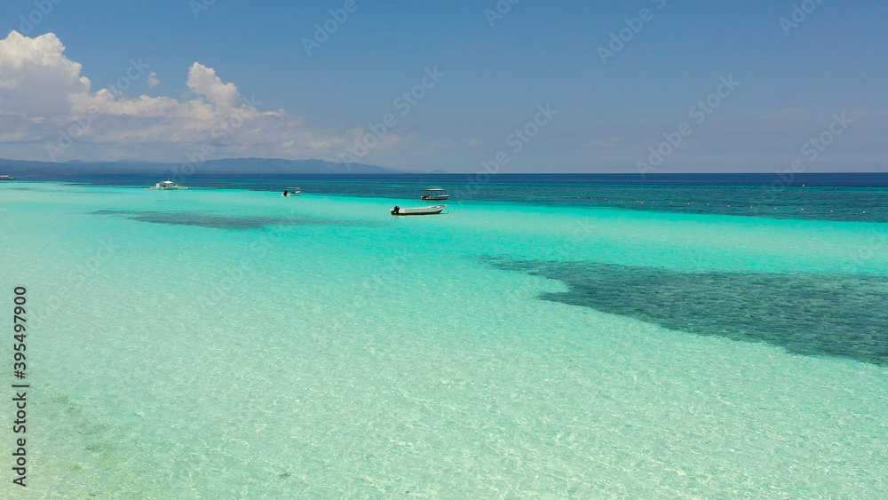 Beautiful tropical beach with white sand and turquoise ocean. Panglao island, Bohol, Philippines.