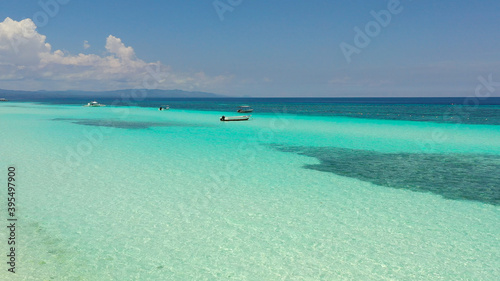Beautiful tropical beach with white sand and turquoise ocean. Panglao island, Bohol, Philippines.