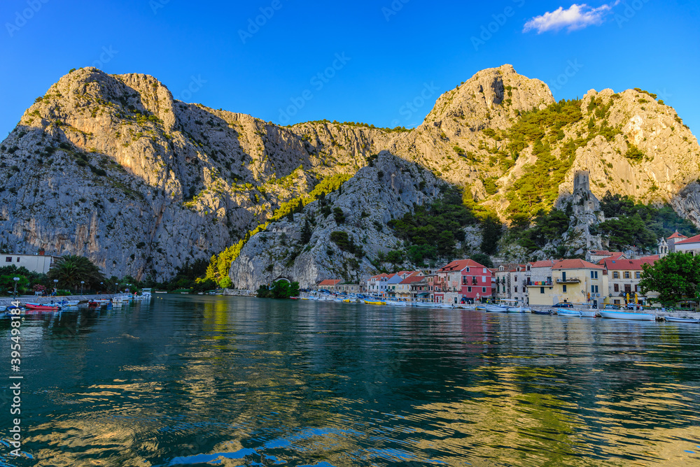 Beautiful view of the mountains over the city of Omis at sunset.