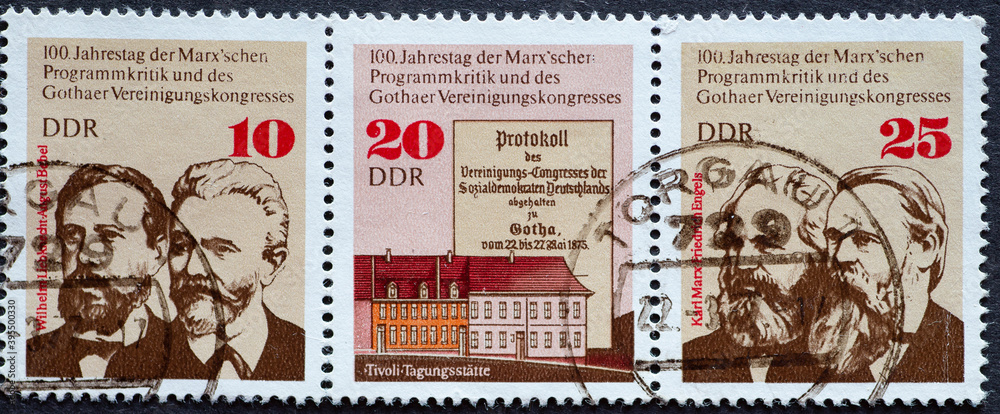 GERMANY, DDR - CIRCA 1975 : a postage stamp from Germany, GDR showing the Gotha Association Congress. Portraits of Wilhelm Liebknecht, August Bebel, Karl Marx and Friedrich Engels