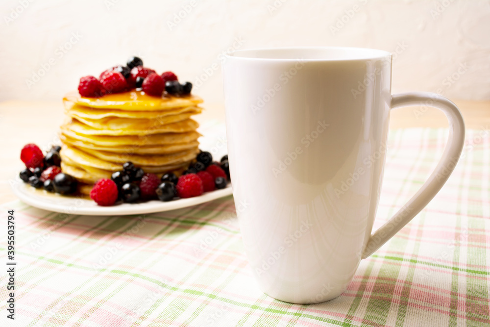 White coffee cappuccino mug mockup with pancakes and berries