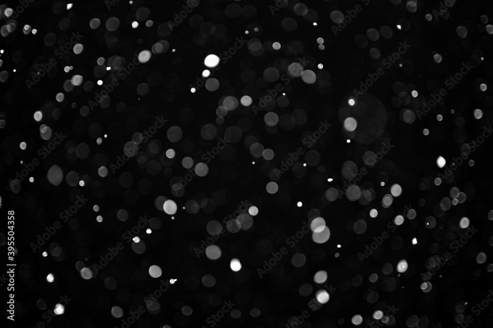 snow bokeh texture on black background snow bokeh texture on black background