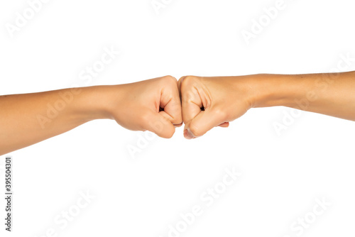 Male and female fists, isolated on white background.