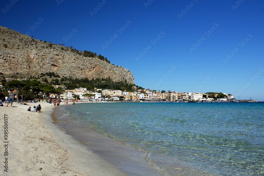 Mondello, Sicily, evocative image of the beach with clear water and a beautiful blue sky