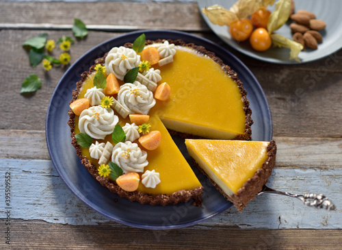 Vegan chocolate orange cake with a crispy base, sliced photo