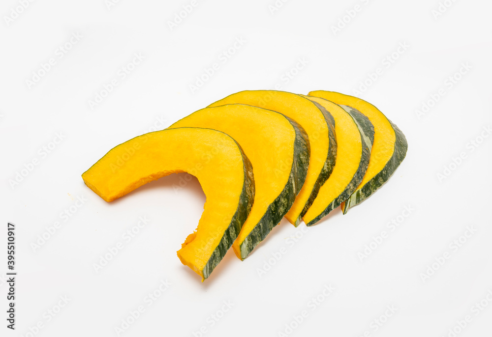 Vegetable: Sliced pumpkin. White background. Vegetable: Sliced pumpkin. White background.