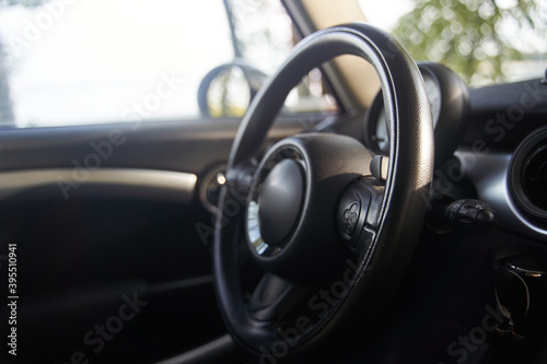 The steering wheel in the car. Torpedo in the car