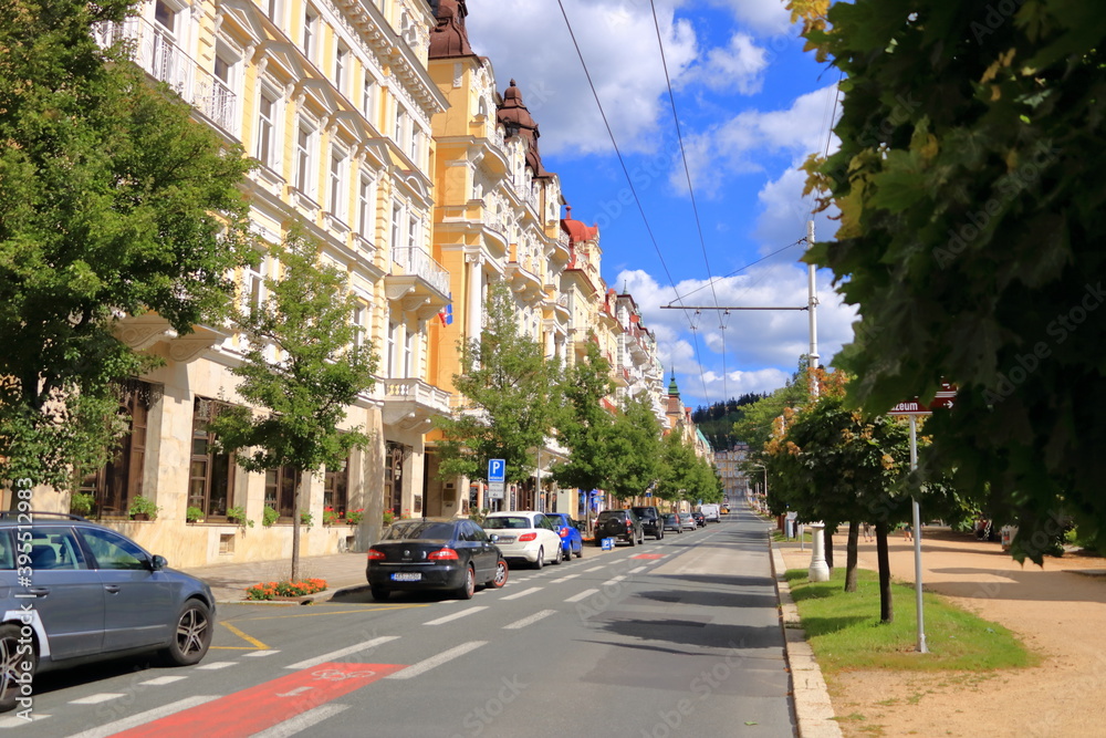 Naklejka premium July 13 2020 Marianske Lazne/Marienbad / Czech Republic: Street and buildings in Marianske Lazne city center, Czech republic